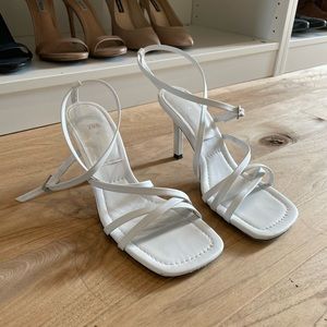 White heeled sandals